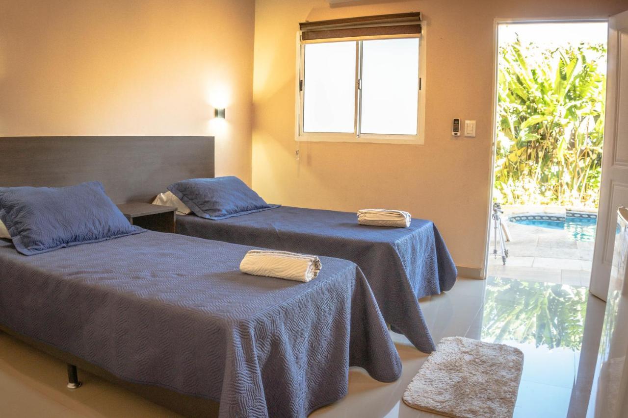 Managua Apart Hotel Пуэрто-Игуасу Экстерьер фото