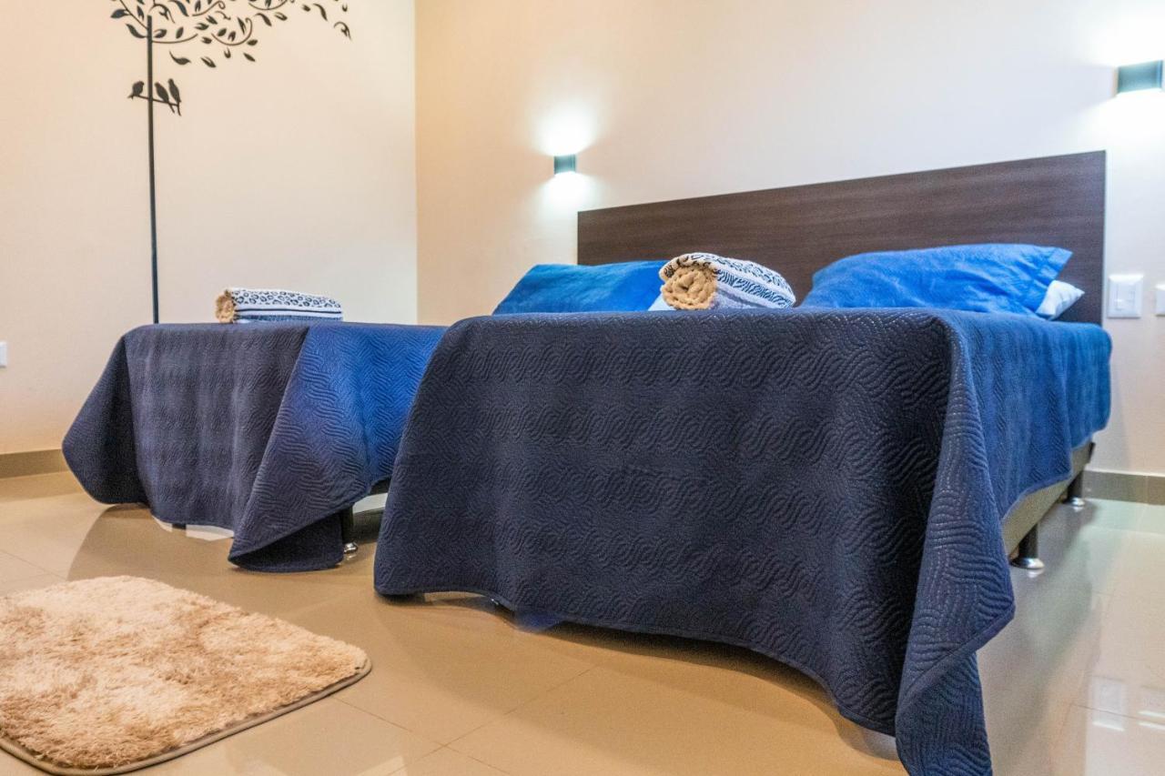Managua Apart Hotel Пуэрто-Игуасу Экстерьер фото
